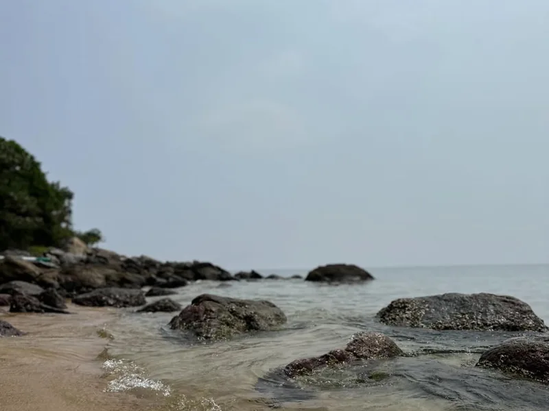 Rocky shoreline at Cham Islands — quiet cove on Cu Lao Cham — UNESCO marine biosphere reserve near Hoi An Vietnam