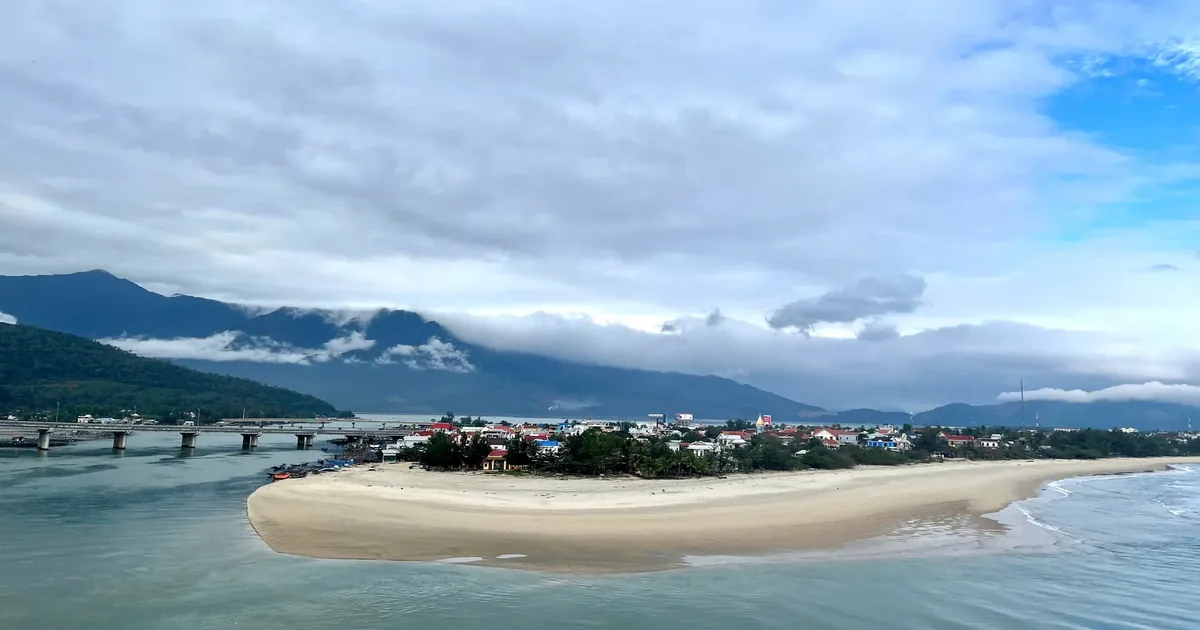 Lang Co bay and sandbar from above — protected lagoon and South China Sea — stop on the Hoi An to Hue scenic drive