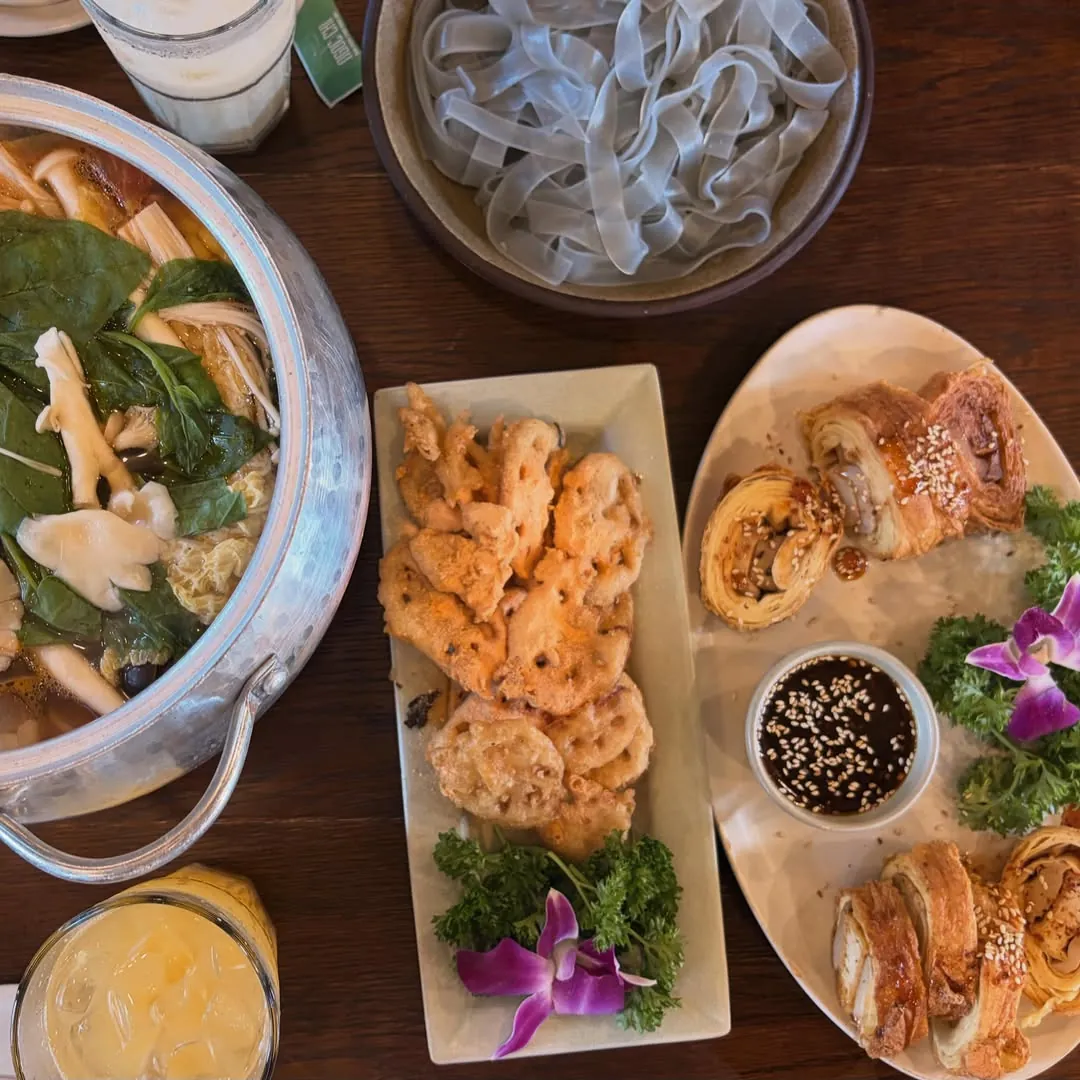 Vegan dishes at Ngoc Chi Restaurant Ba Na Hills — mushroom hotpot, fried lotus root and layered spring rolls from the Michelin Selected menu