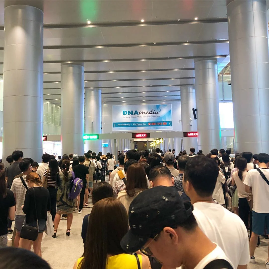 Busy immigration queue at Da Nang International Airport during peak arrival time