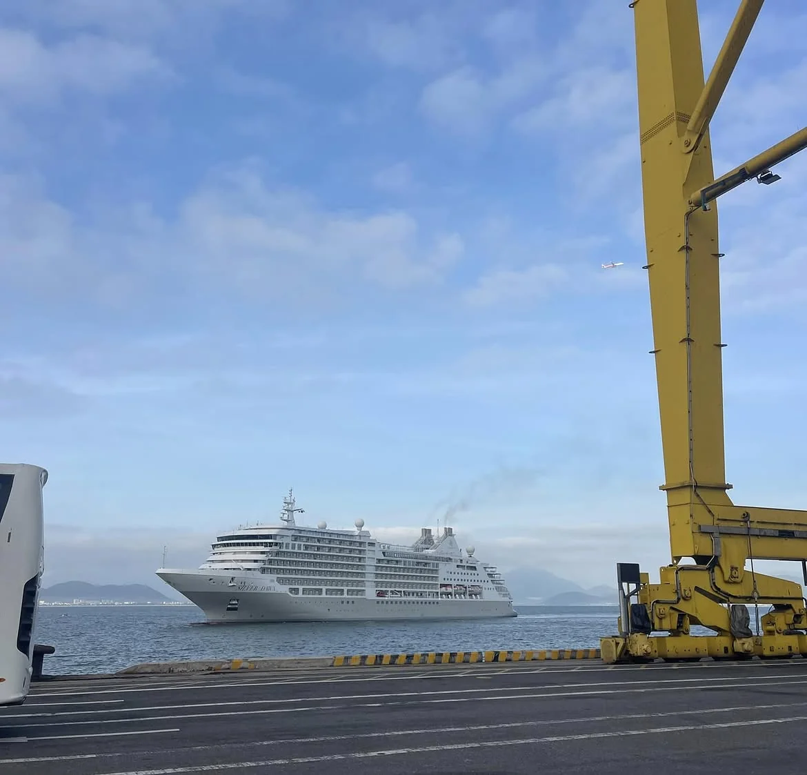 Cruise ship at Chan May Port pier before passengers meet private shore excursion drivers