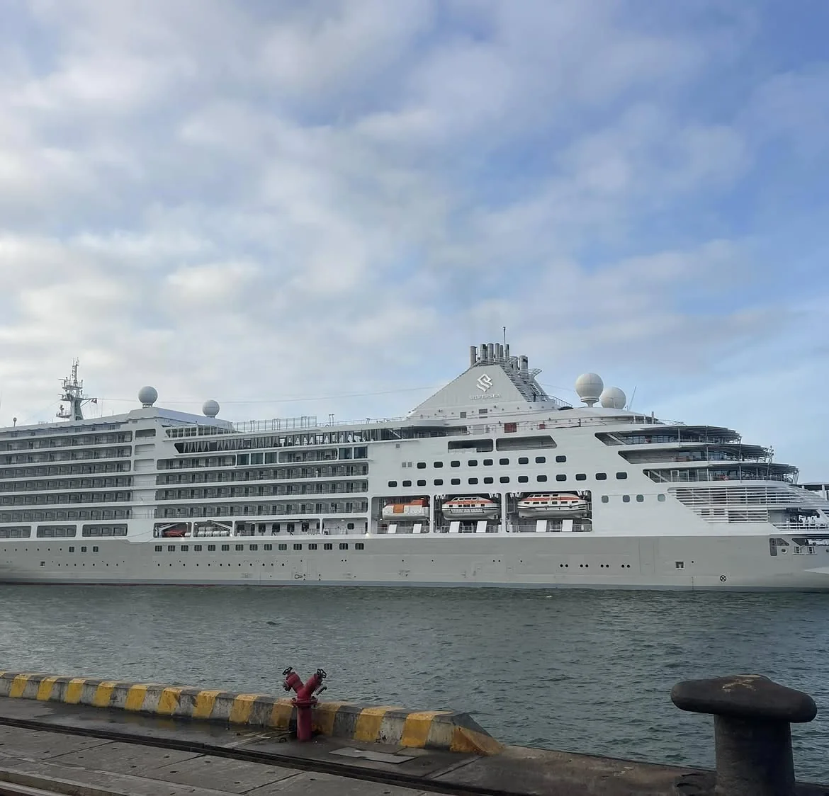 Large cruise ship docked at Chan May Port in Central Vietnam during cruise season