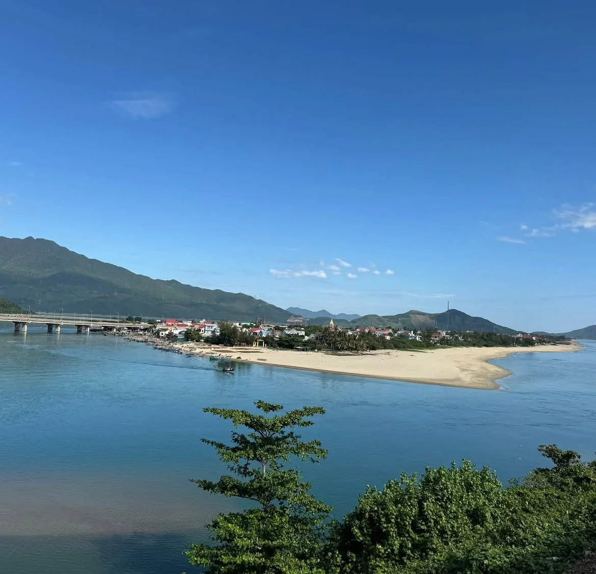 Lang Co Bay coastal view from the Da Nang to Hue heritage train route before Hue station pickup and private car sightseeing