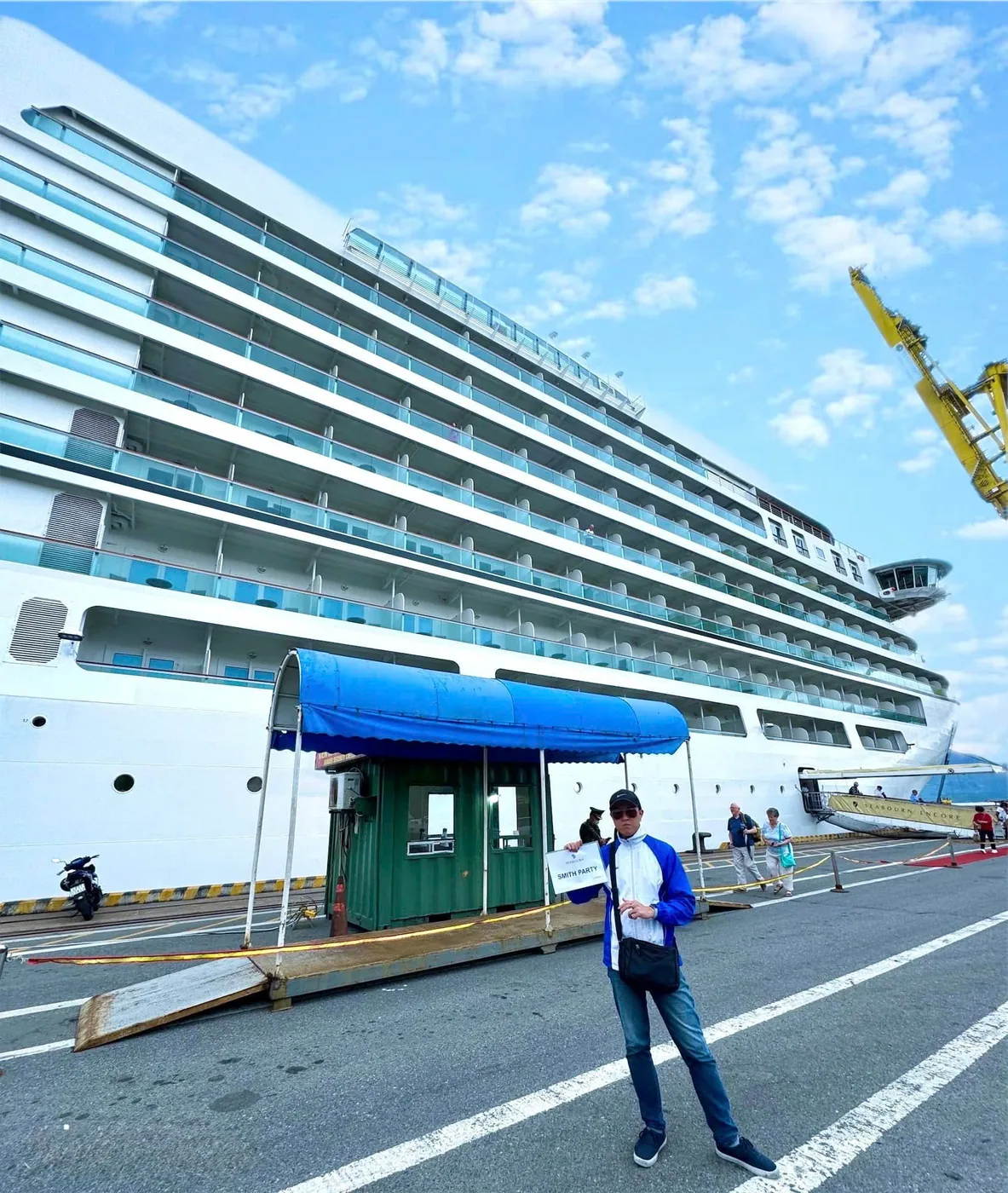 Driver with name sign at Tien Sa Port pier for cruise shore excursion guests