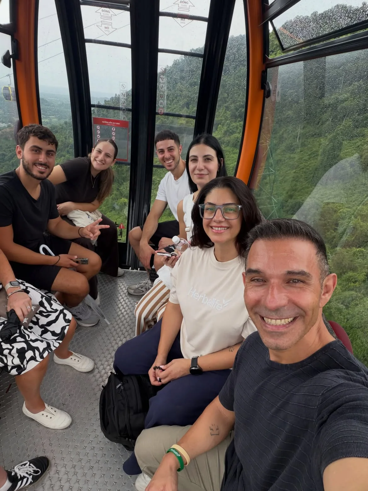Guests inside Ba Na Hills cable car during a car plus tickets package from Da Nang or Hoi An